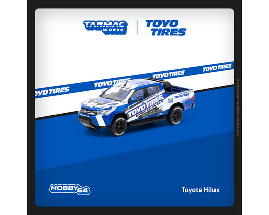 Tarmac Works 1:64 Toyota Hilux TOYO Tires – Blue with Graphics – Hobby64 - House of Cars Virginia